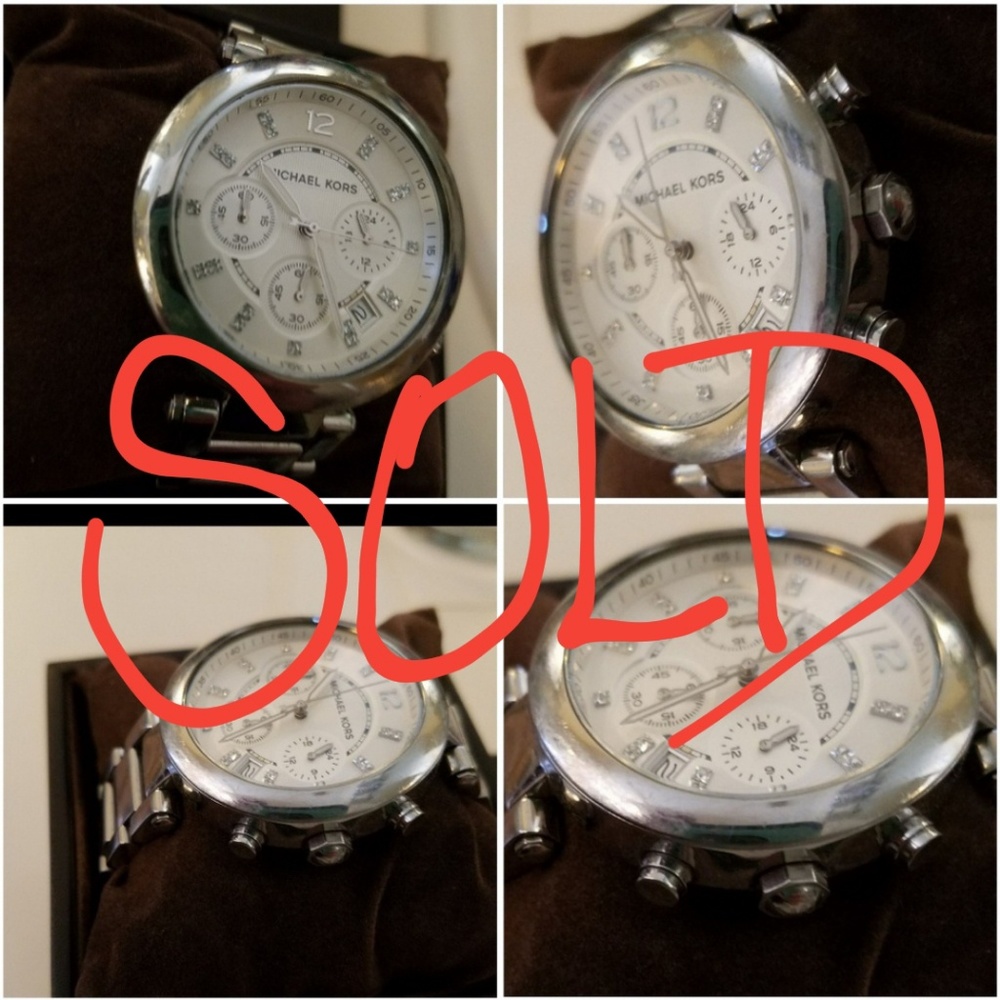 "SOLD!" Michael Kors big face SS watch with